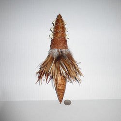 Feathered Pahi, a Hawaiian war weapon hand crafted on Hawaii. 